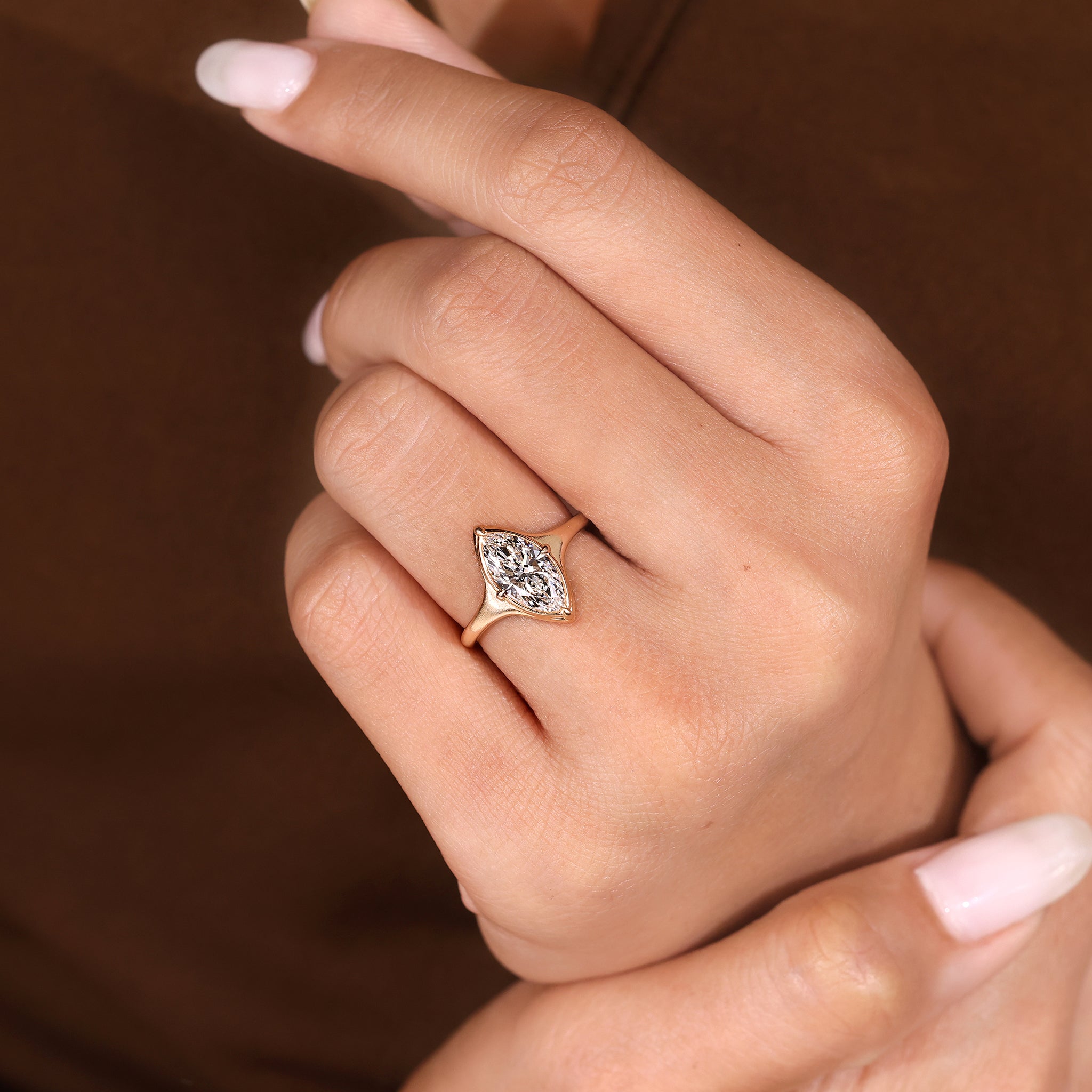 Marquise Cut Diamond Engagement Ring in Bezel Setting