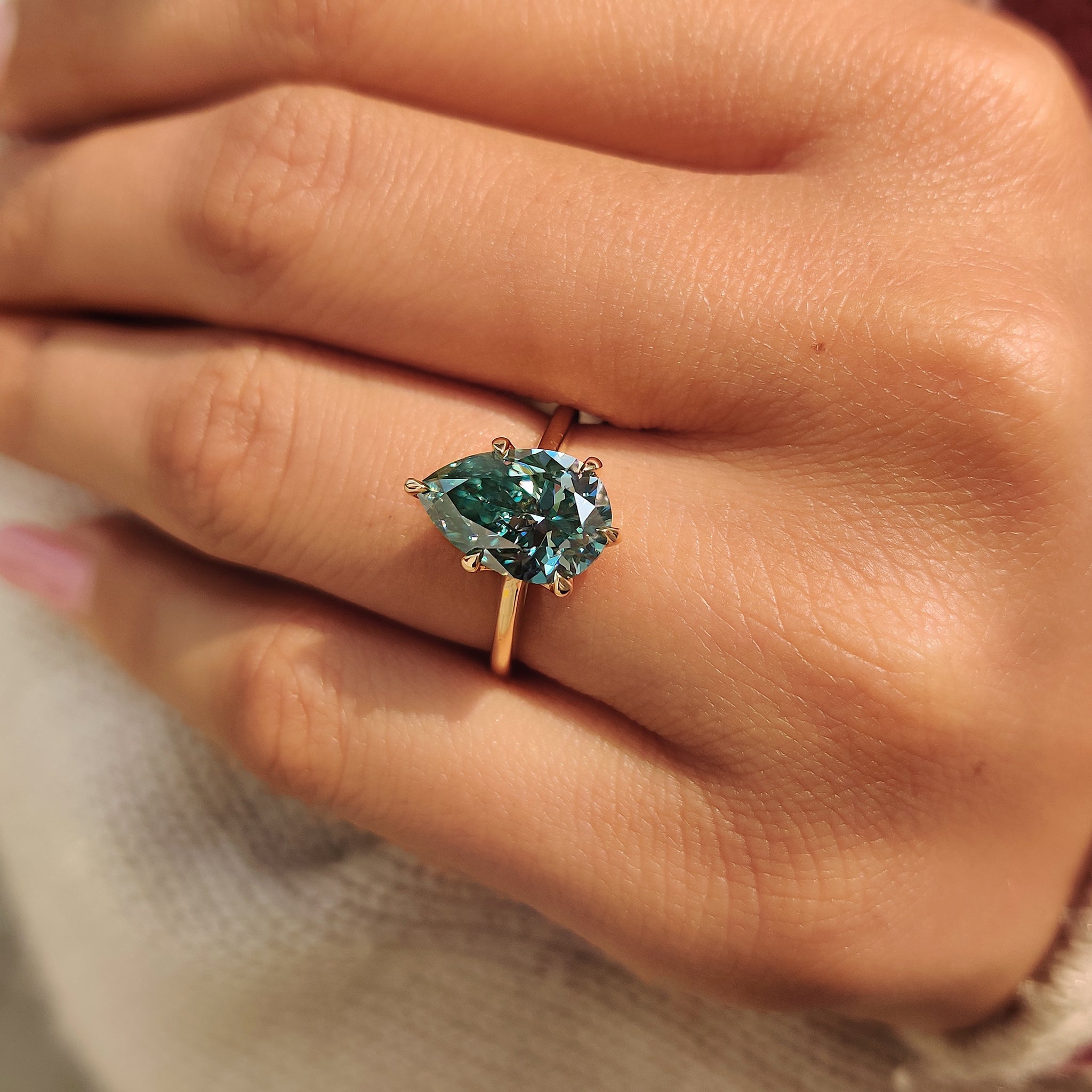 Cyan Blue Pear Cut Moissanite Ring in Solitaire Style