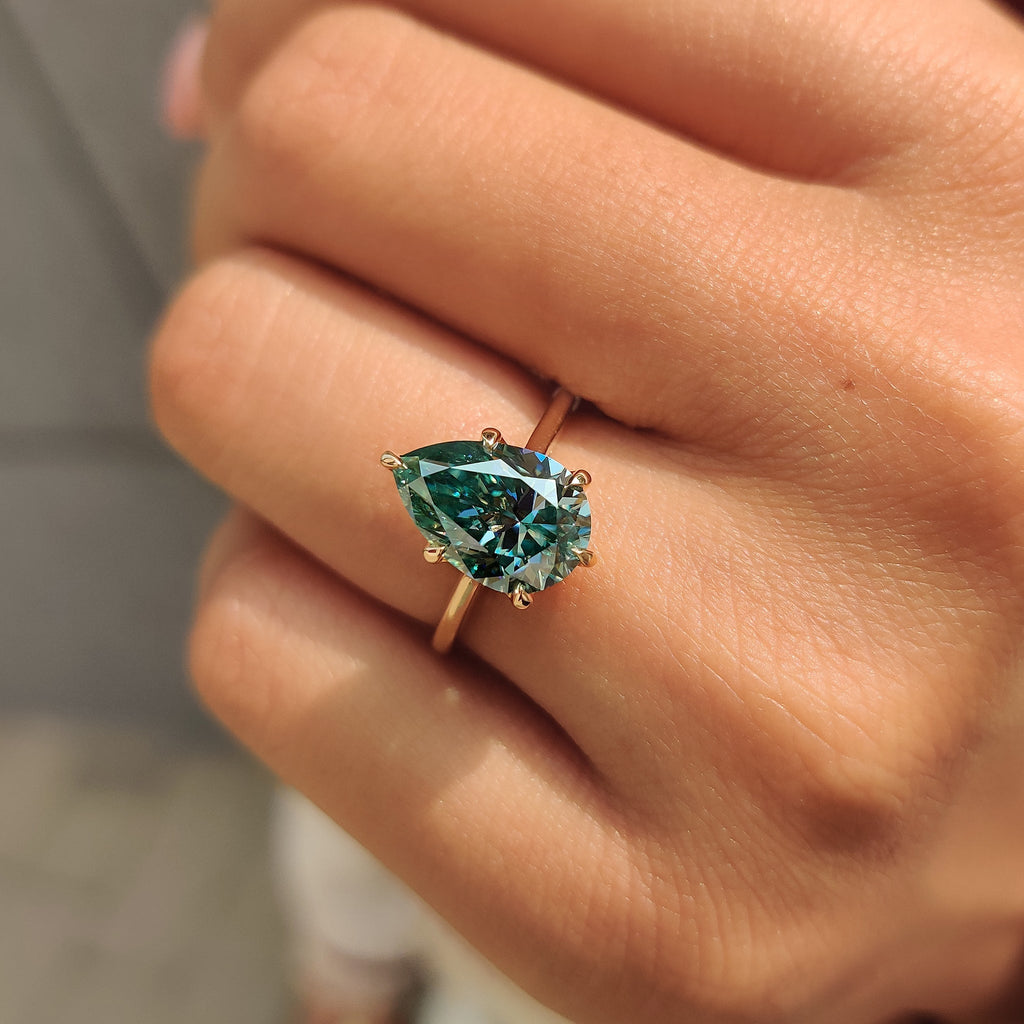 Cyan Blue Pear Cut Moissanite Ring in Solitaire Style