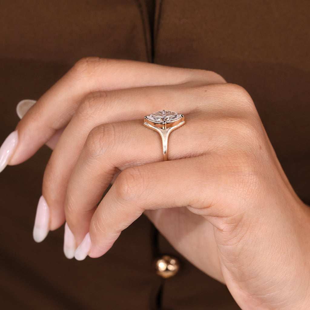 Marquise Cut Diamond Engagement Ring in Bezel Setting
