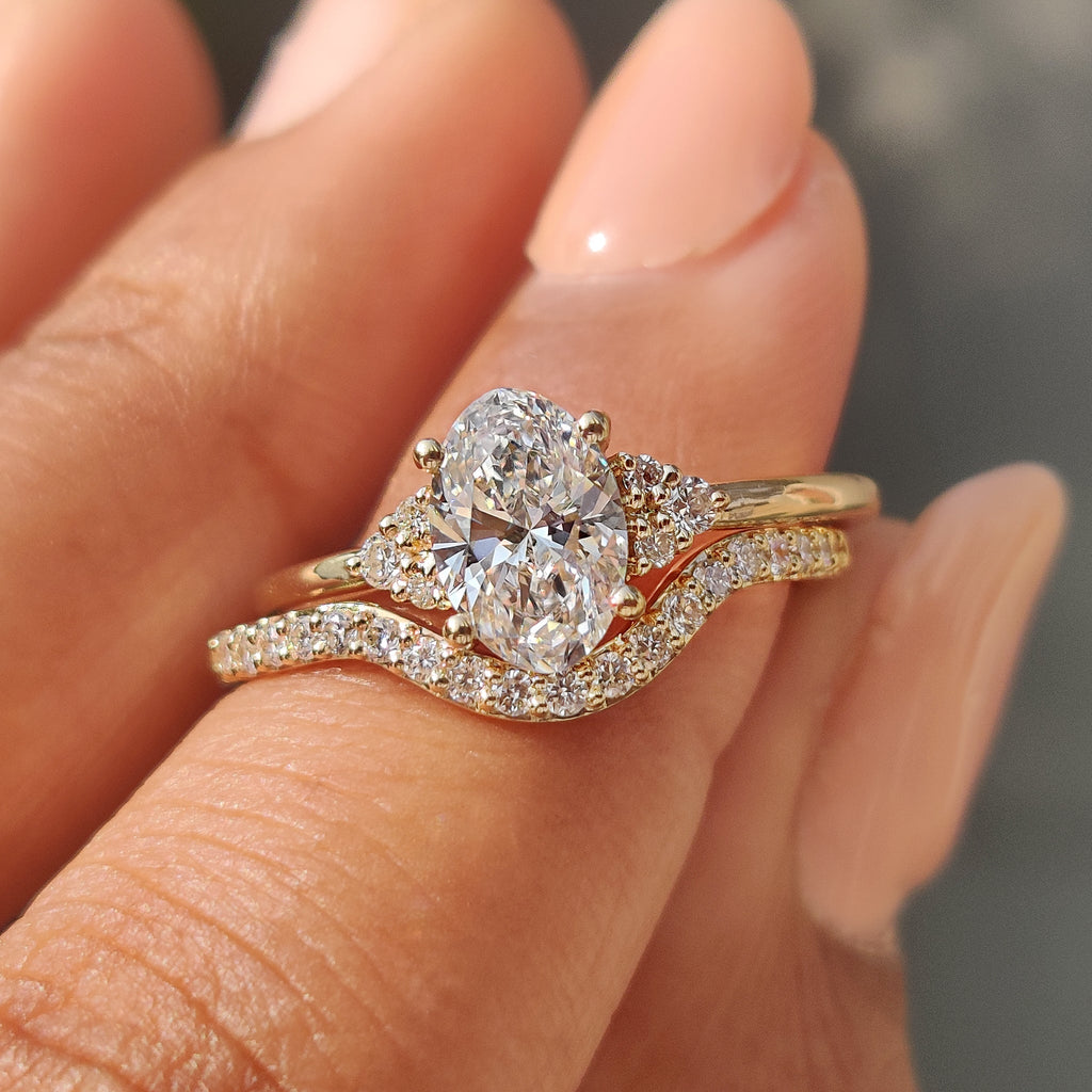 Oval Engagement Ring with Wedding Band in Half Eternity Style