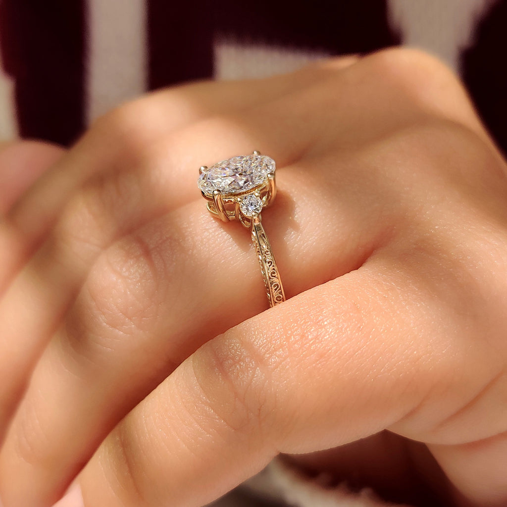 Oval Cut Vintage Engagement Ring with Filigree Design on Shank