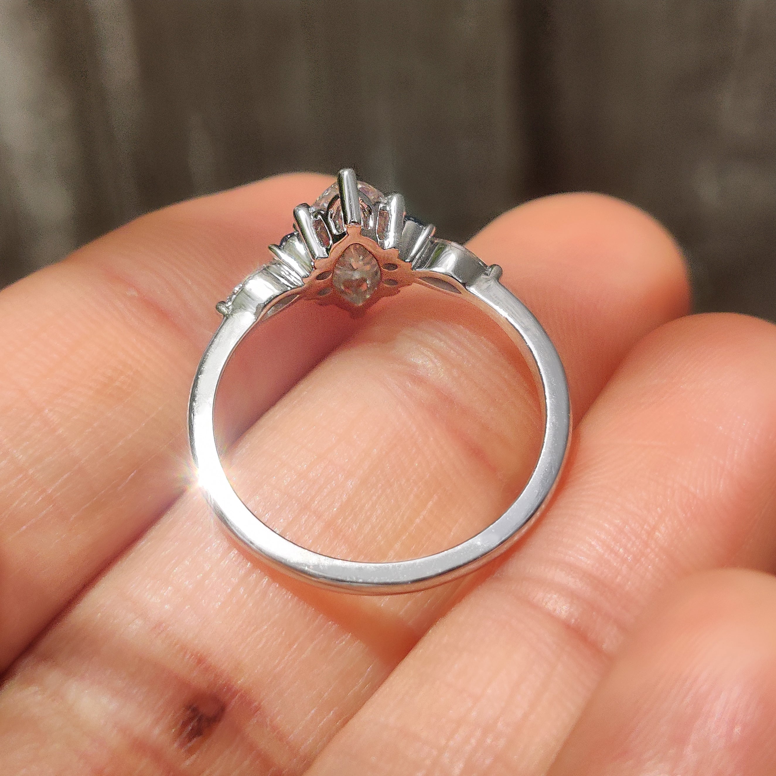 Marquise Cut Engagement Ring With Blue Sapphire Side Stone Style