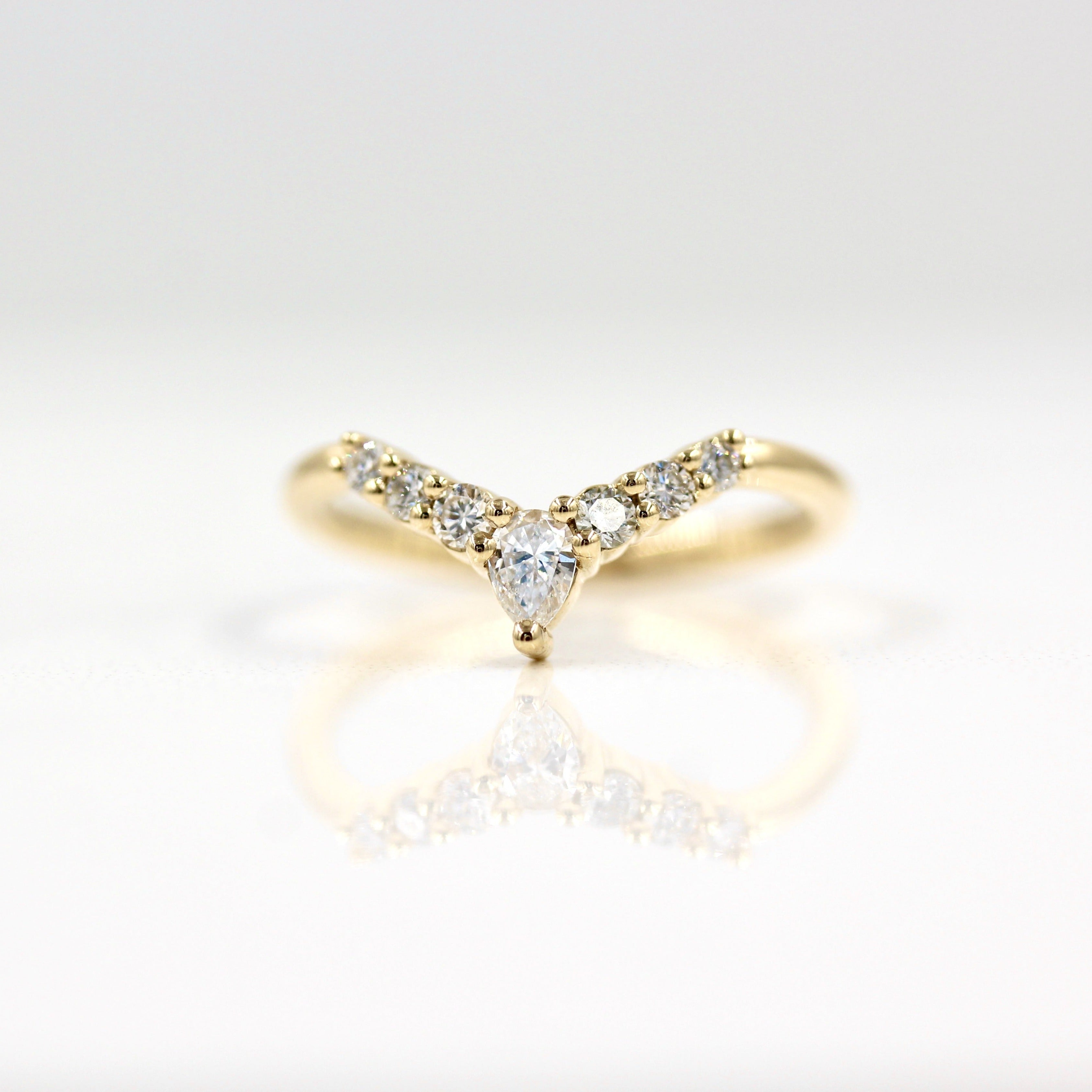 0.31 TCW Round & Pear Cut Curved Moissanite Wedding Band
