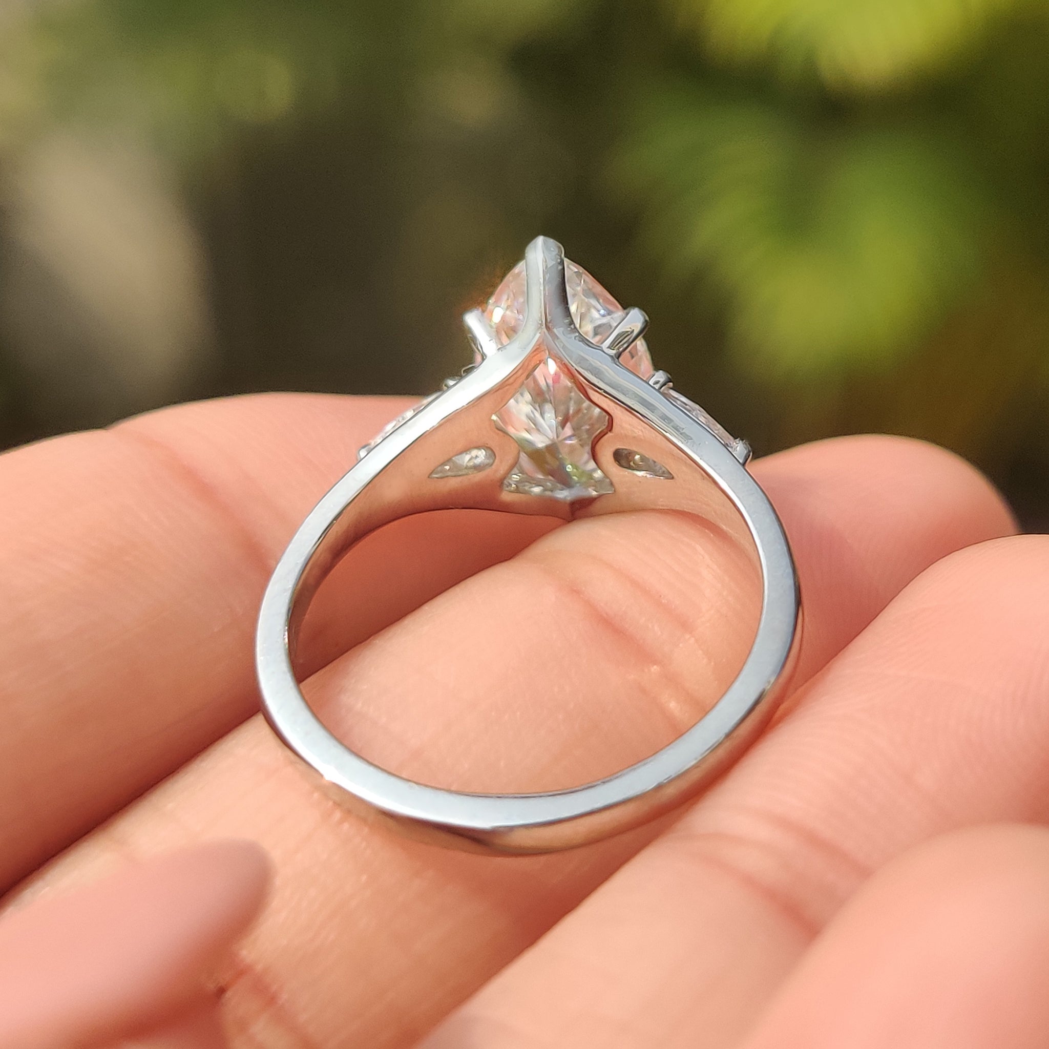 Three Stone Marquise Diamond Ring with Pear Side Diamond