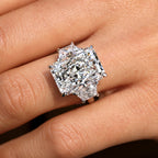 10 - 14 Carat Radiant Cut Diamond Ring with Trapezoid Side Stones