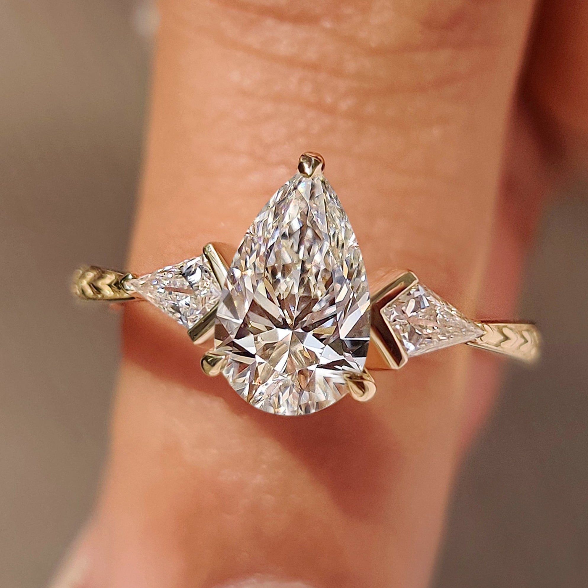 Pear and Kite Cut Three Diamond Ring with Art Deco Band
