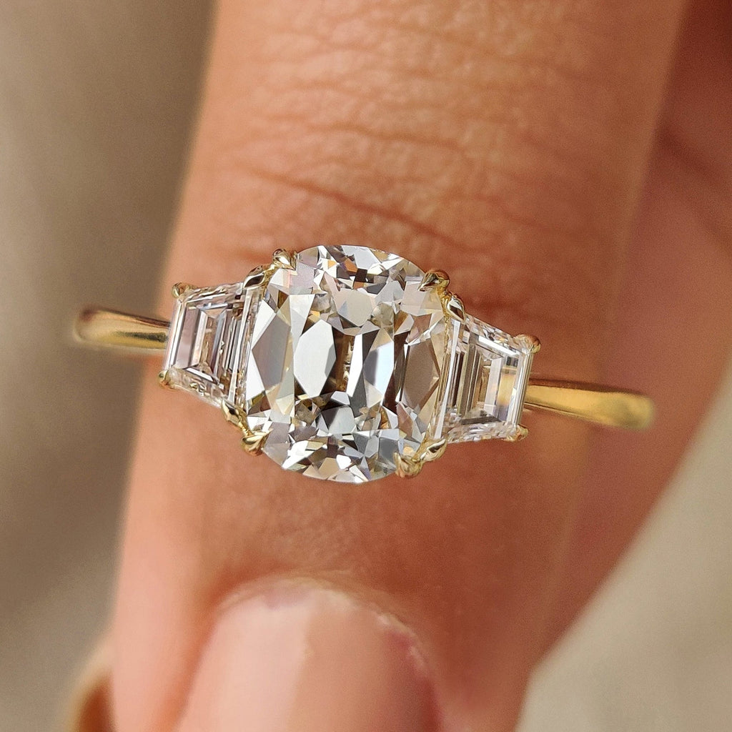 Old Mine Cushion Cut Diamond Ring with Trapezoid Side Stones