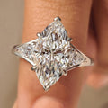 Three Stone Marquise Diamond Ring with Pear Side Diamond