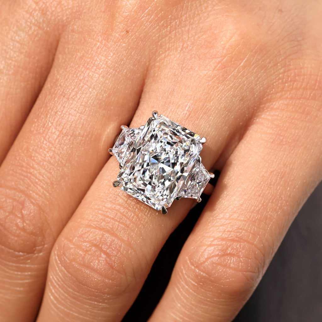 10 - 14 Carat Radiant Cut Diamond Ring with Trapezoid Side Stones