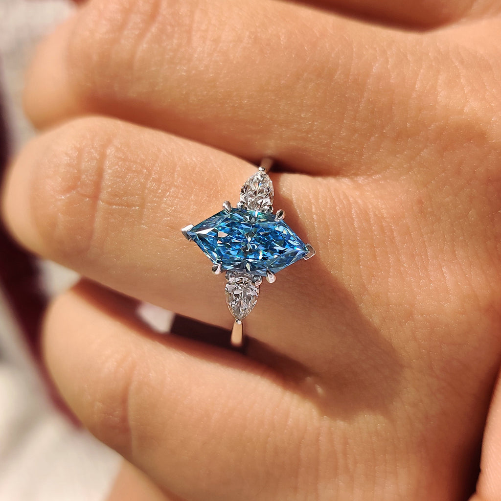 Blue Dutch Marquise Three Stone Ring with Pear Side Stones