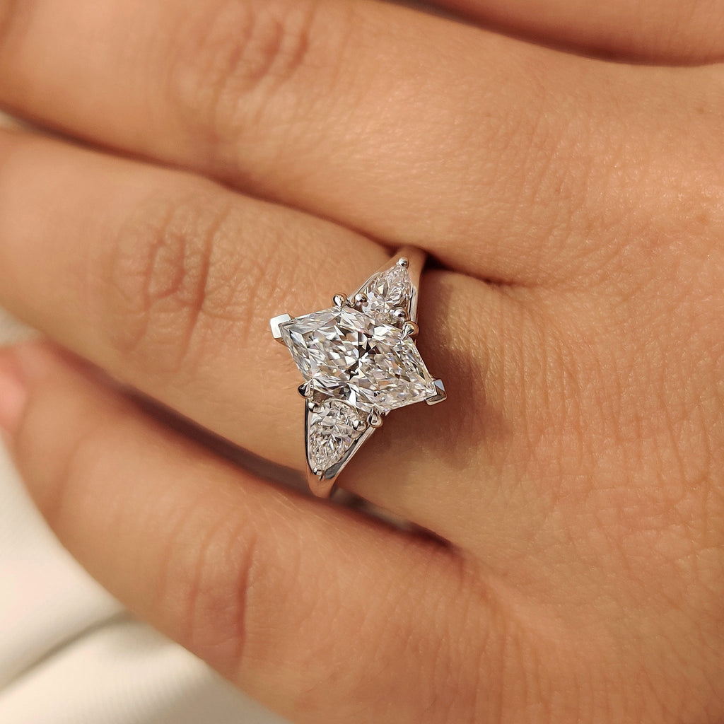 Three Stone Style Dutch Marquise Diamond Ring With Pear Side Stone