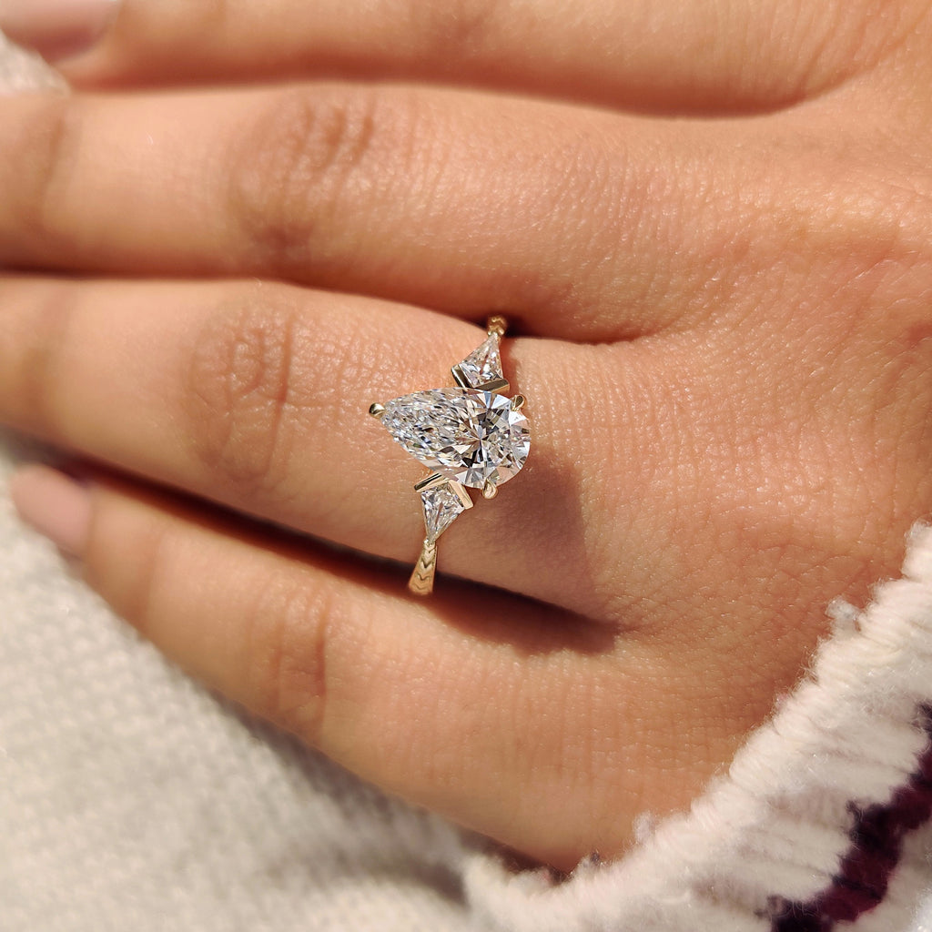 Pear and Kite Cut Three Diamond Ring with Art Deco Band