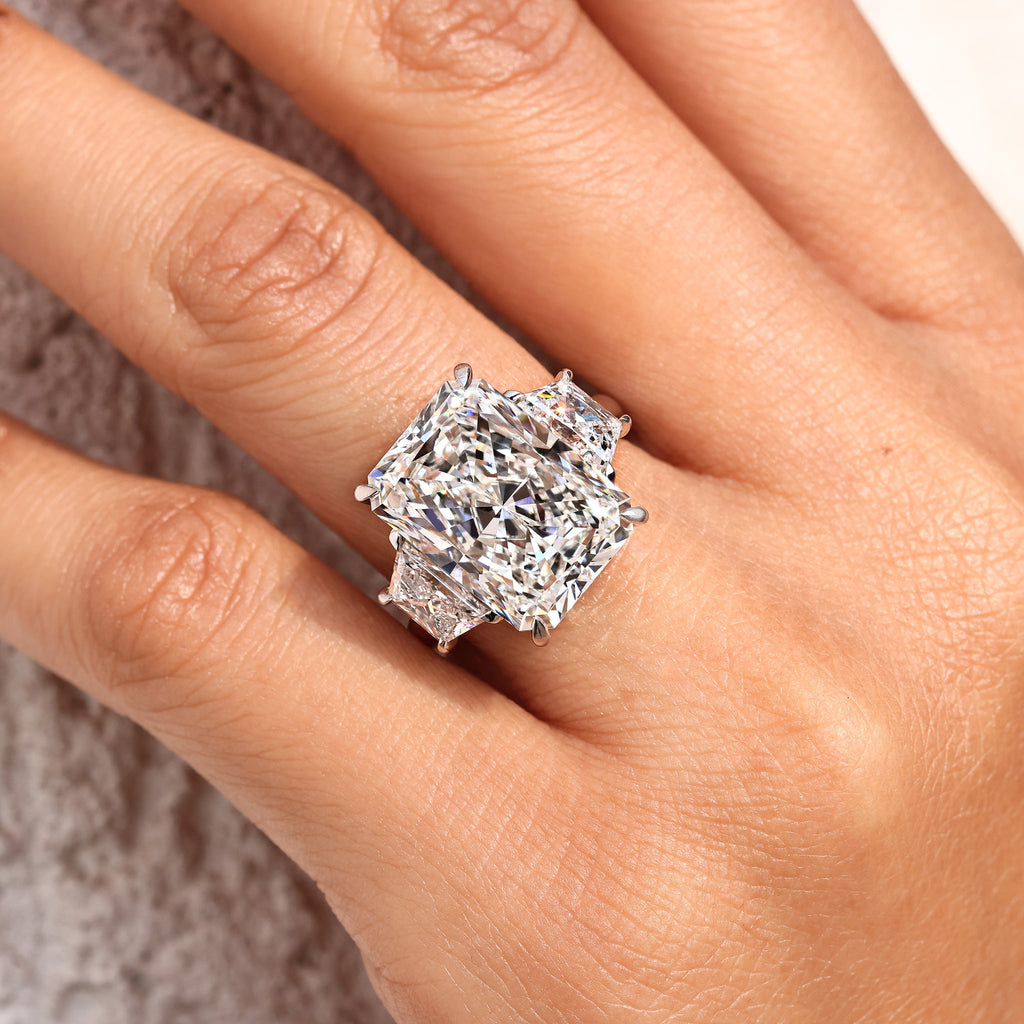 10 - 14 Carat Radiant Cut Diamond Ring with Trapezoid Side Stones