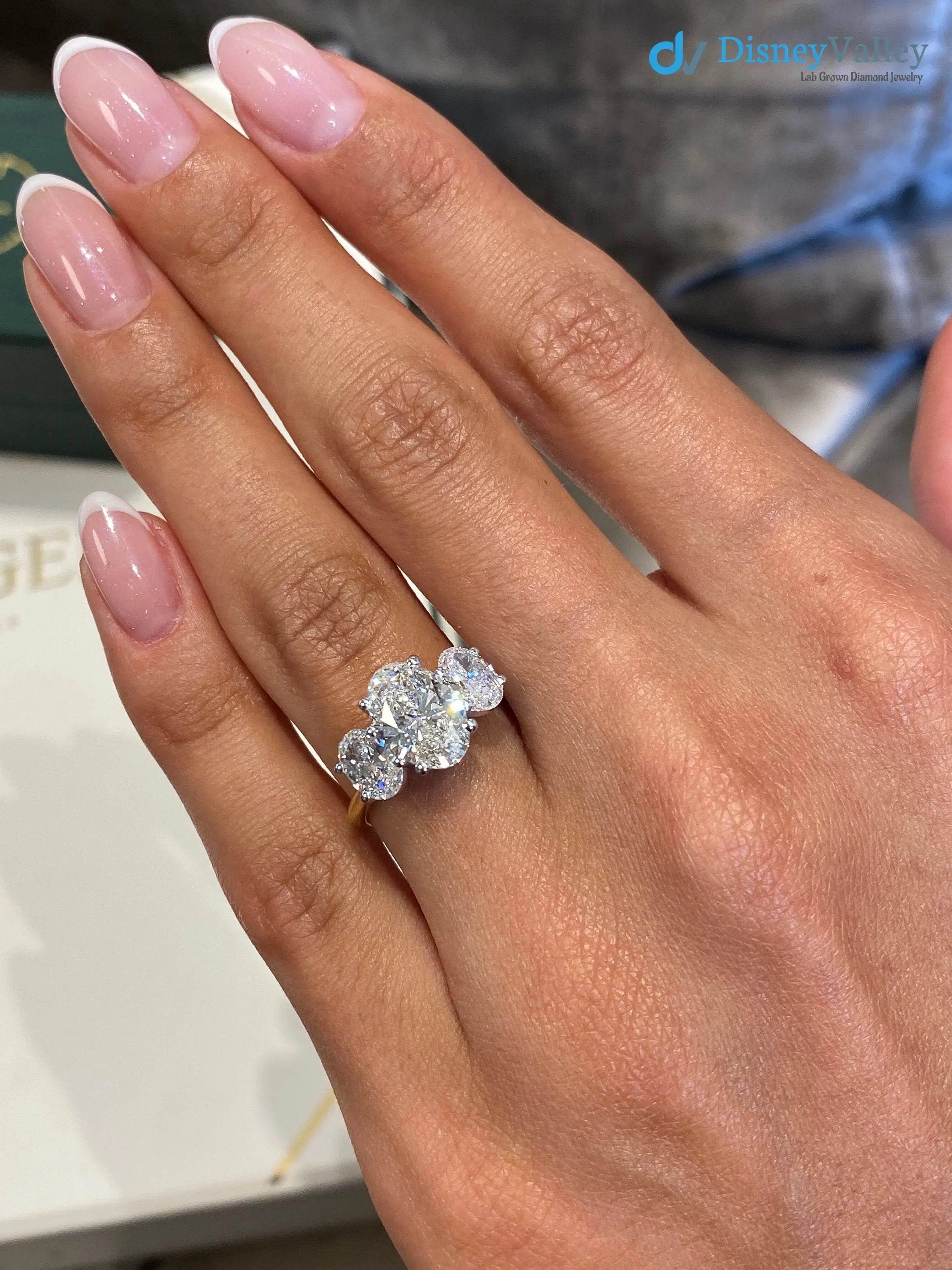 Tri Stone 3.0 Ct IGI Certified E/VS1 Oval Cut Lab Grown Diamond Engagement Ring - DisneyValley Main image