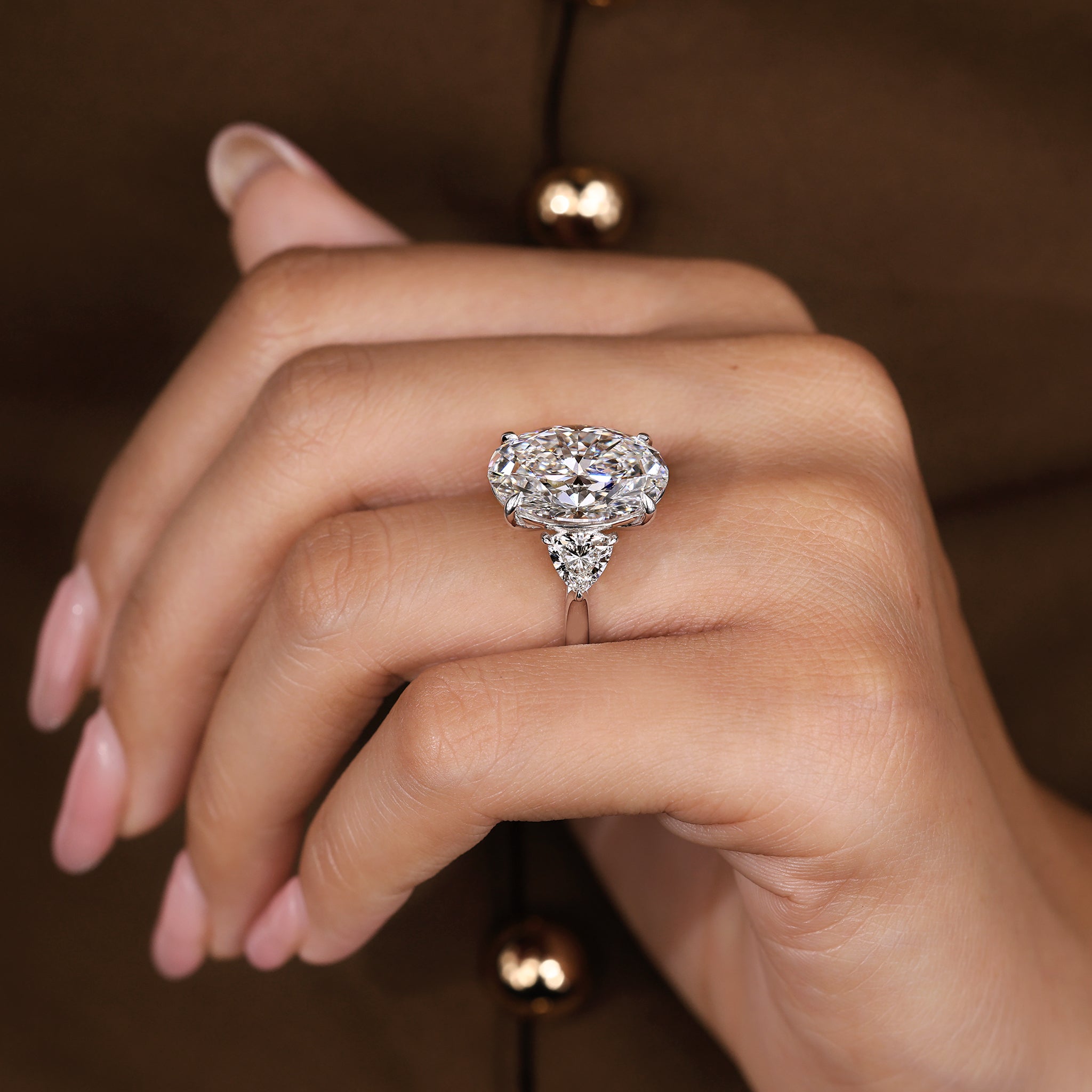 IGI Certified 10 -15 Carat Oval Diamond Ring in Three Stone Style