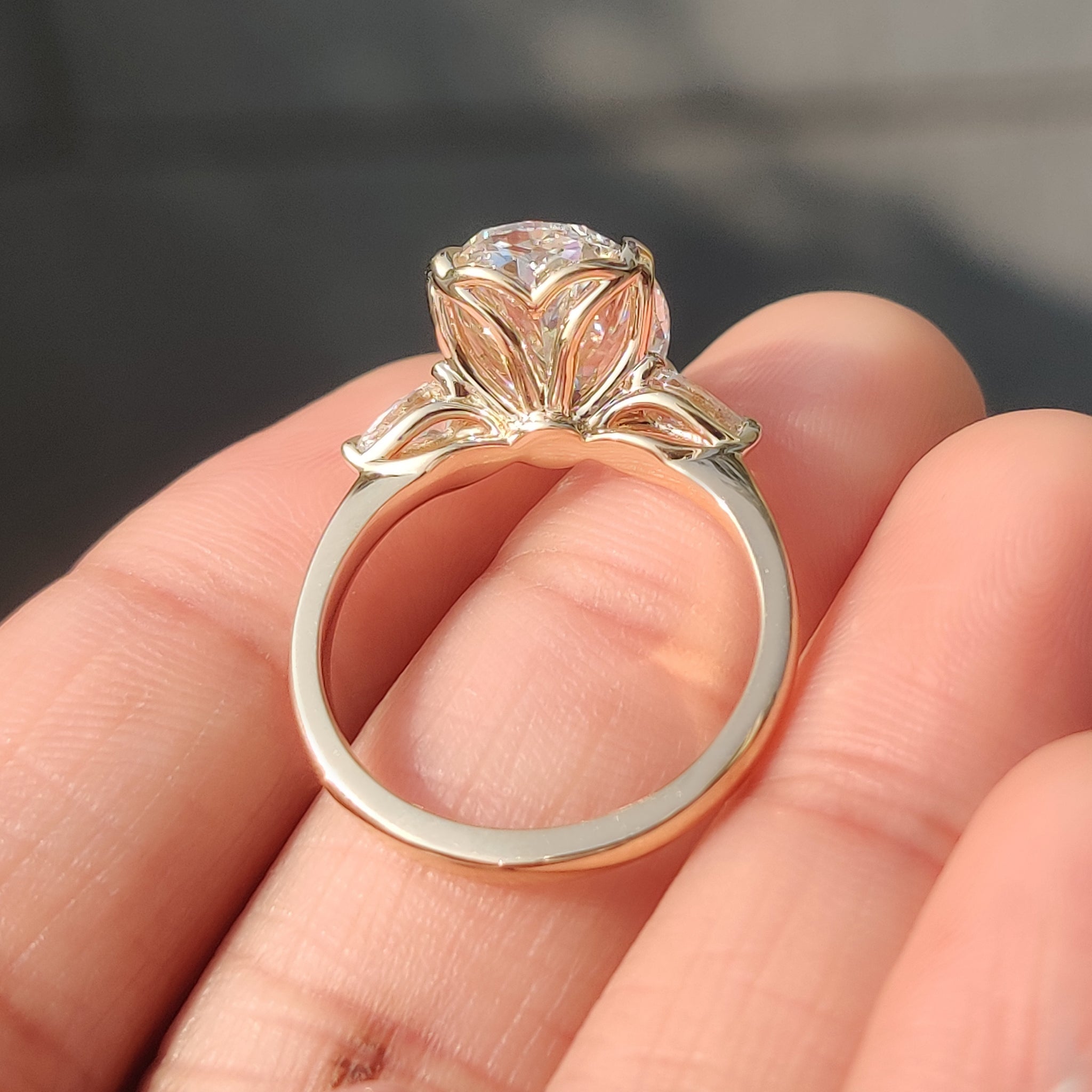 Oval Diamond Three Stone Engagement Ring With Pear Side Stone