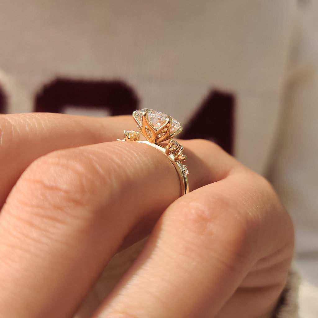 Oval Diamond Ring With Round Side Stones