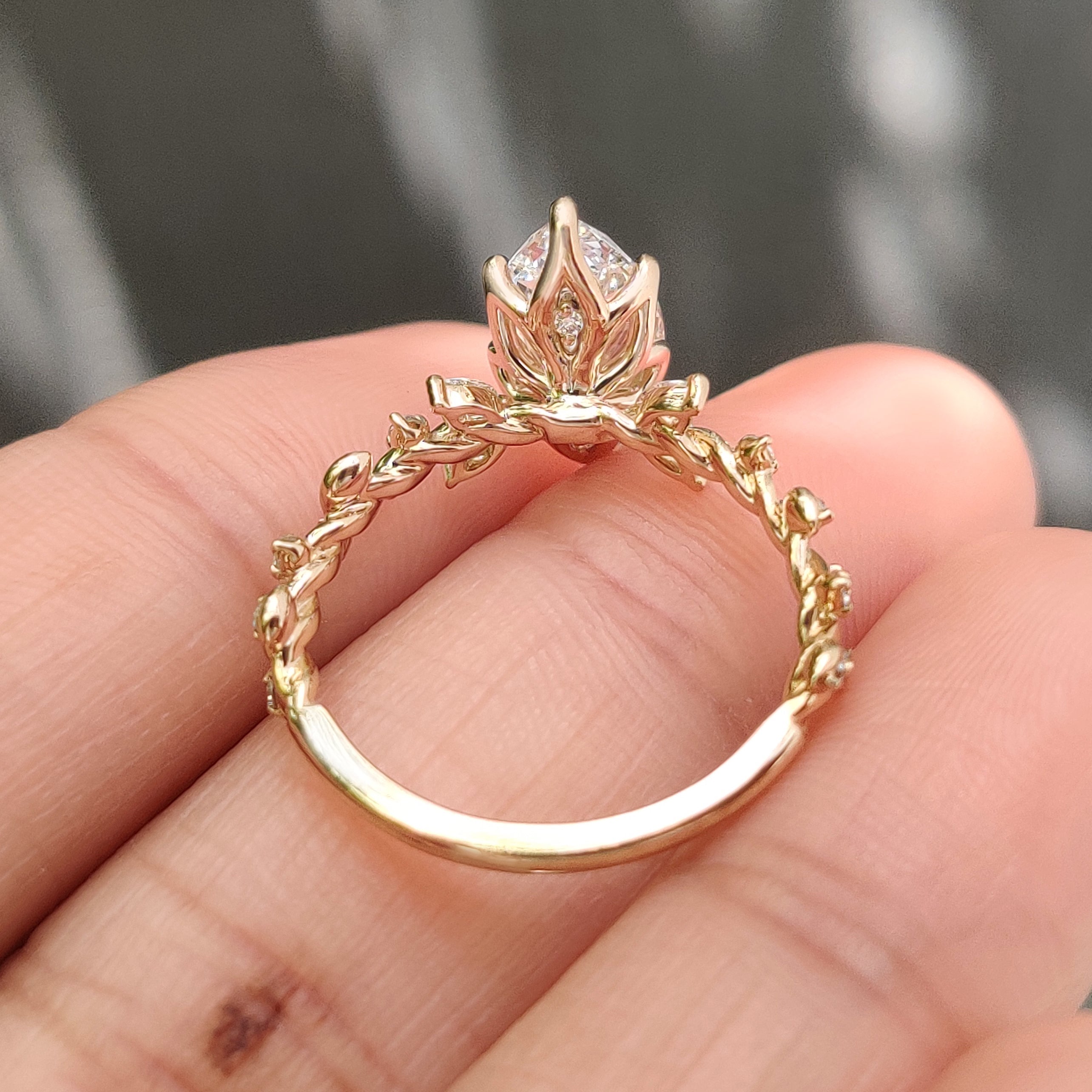 Marquise Diamond Ring in Nature Inspired Setting