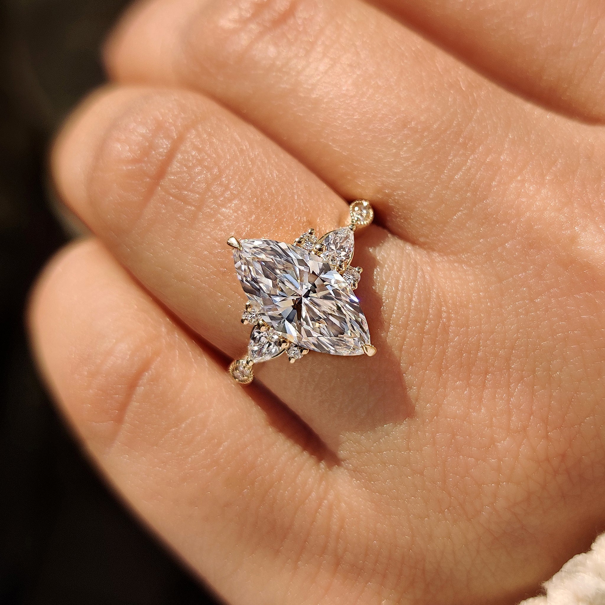 Marquise Cut Ring with Pear and Round Side Stones
