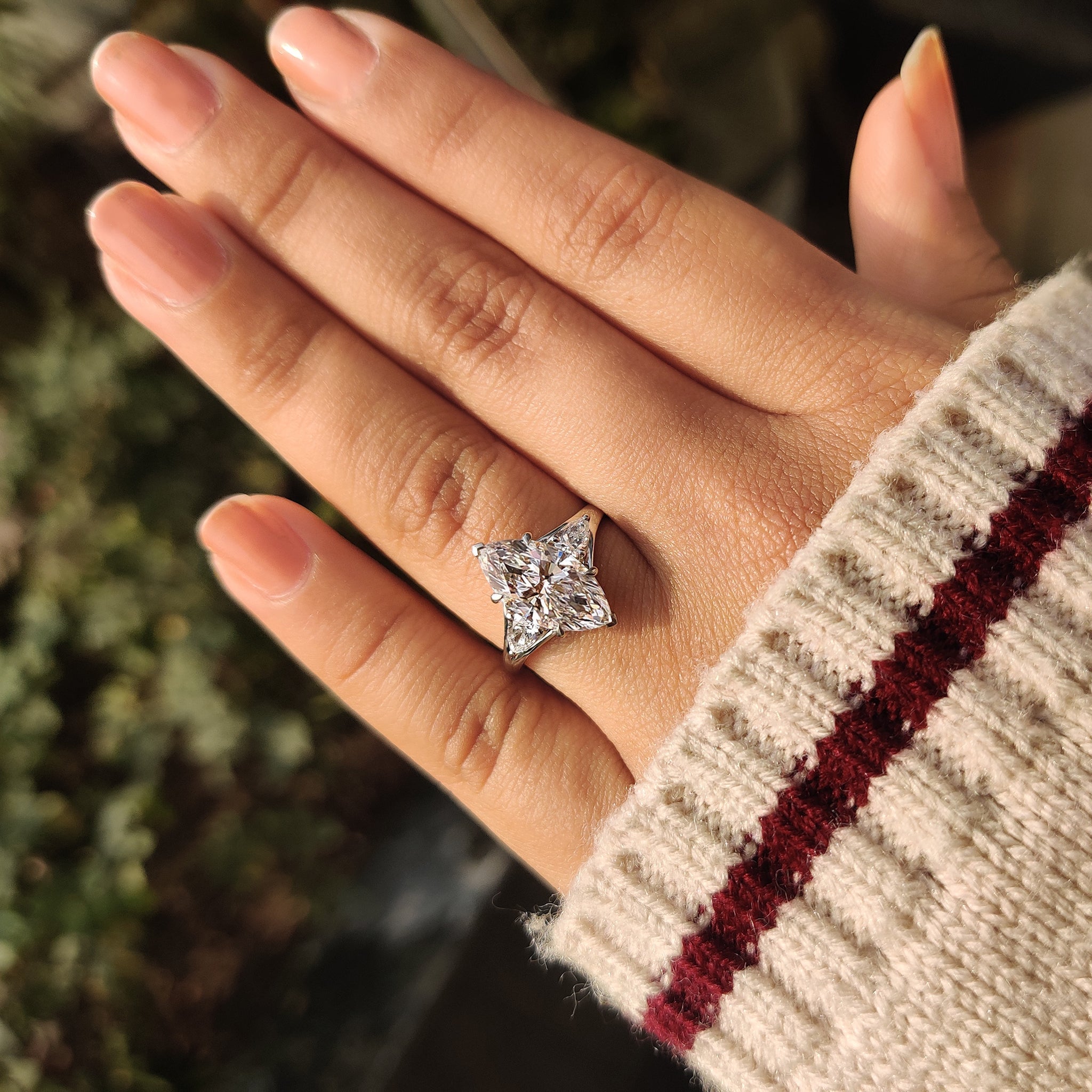 Three Stone Marquise Diamond Ring with Pear Side Diamond