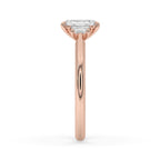 Emerald Cut Diamond Ring With trapezoid side stone