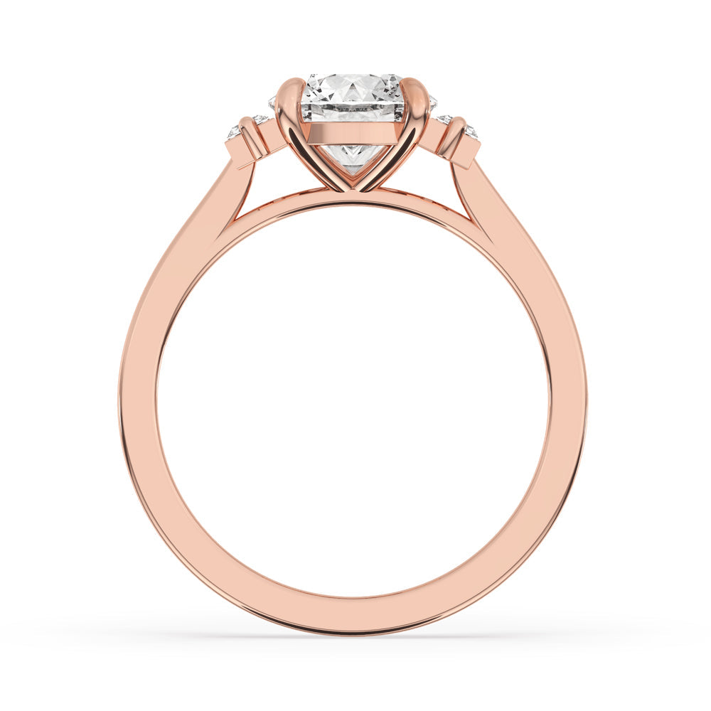 Round and Baguette Cut Three Stone Engagement Ring
