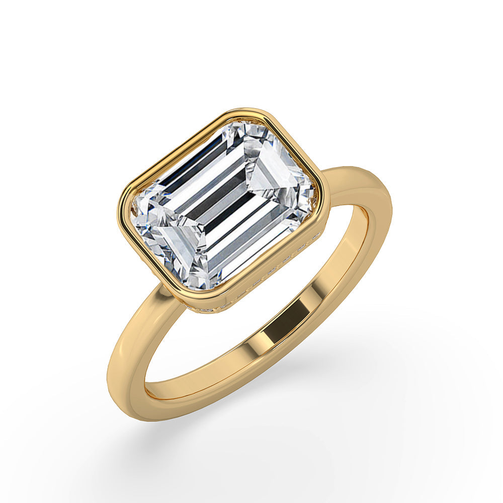 Bezel Emerald Cut Engagement Ring In Yellow Gold