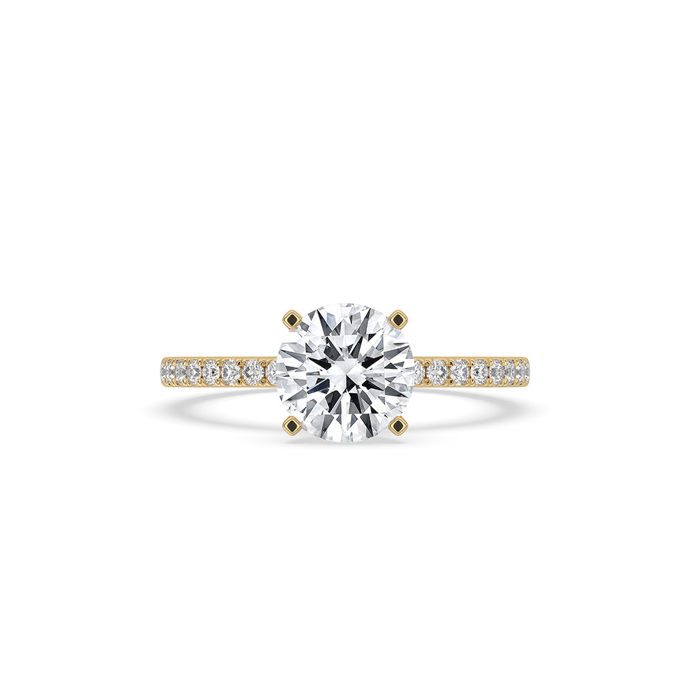 Round Cut Engagement Ring In Pave Setting