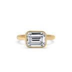 Bezel Emerald Cut Engagement Ring In Yellow Gold