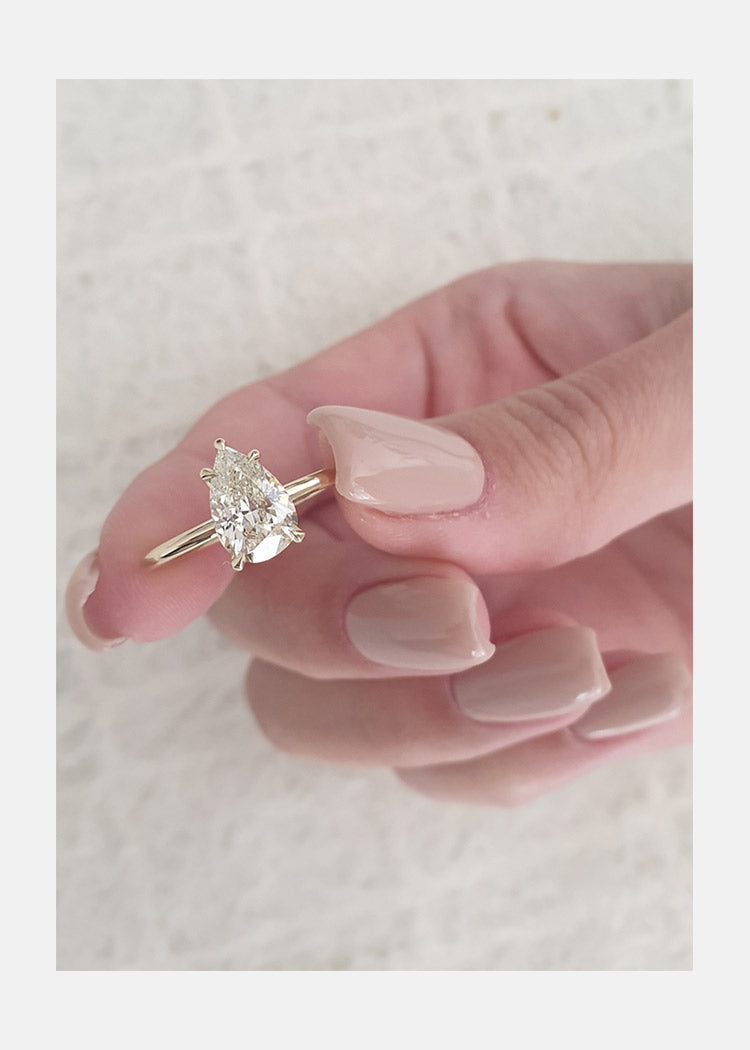 1.31 CT Pear Cut Moissanite Solitaire Diamond Engagement Ring