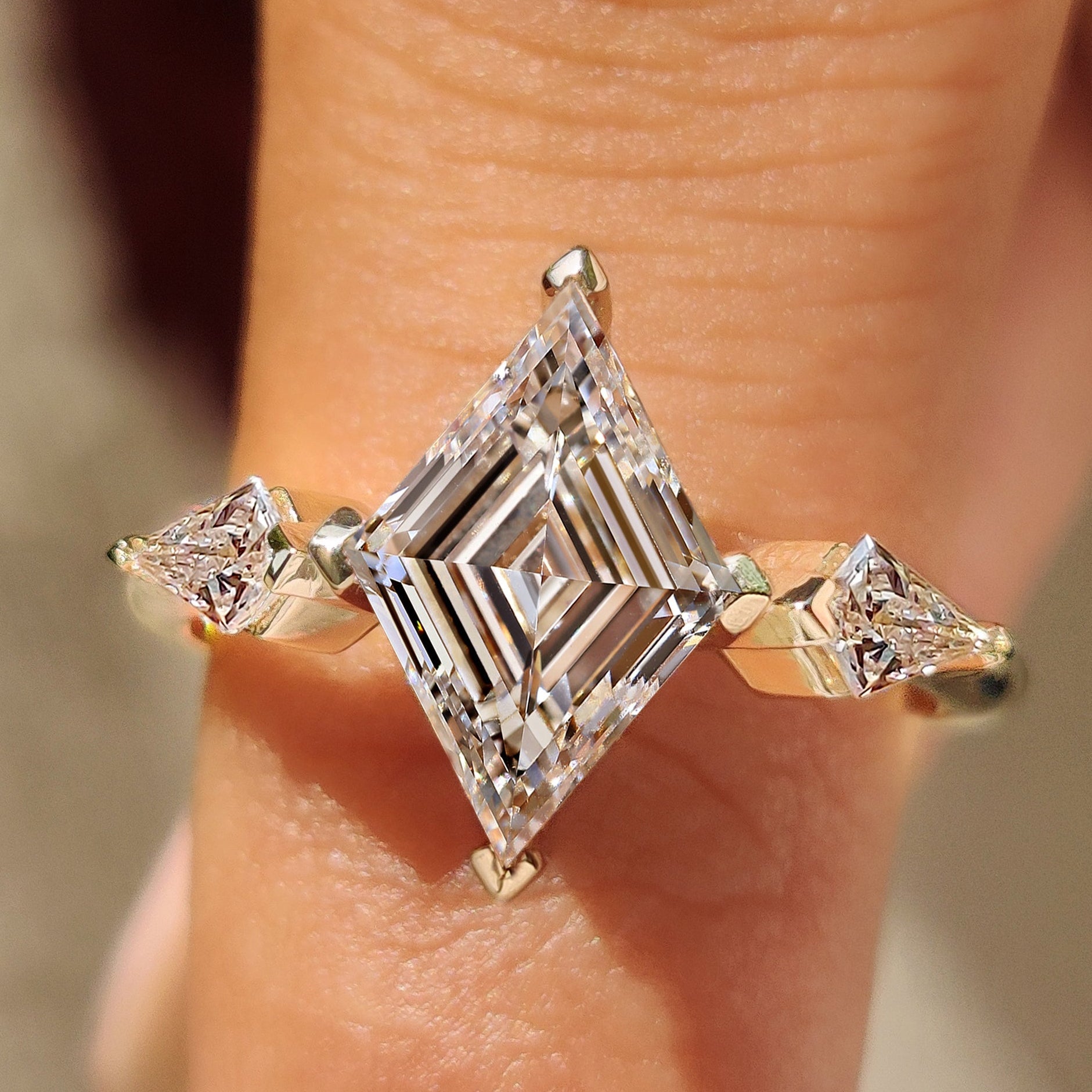 Lozenge Cut Engagement Ring with Kite Cut Side Stone Main image