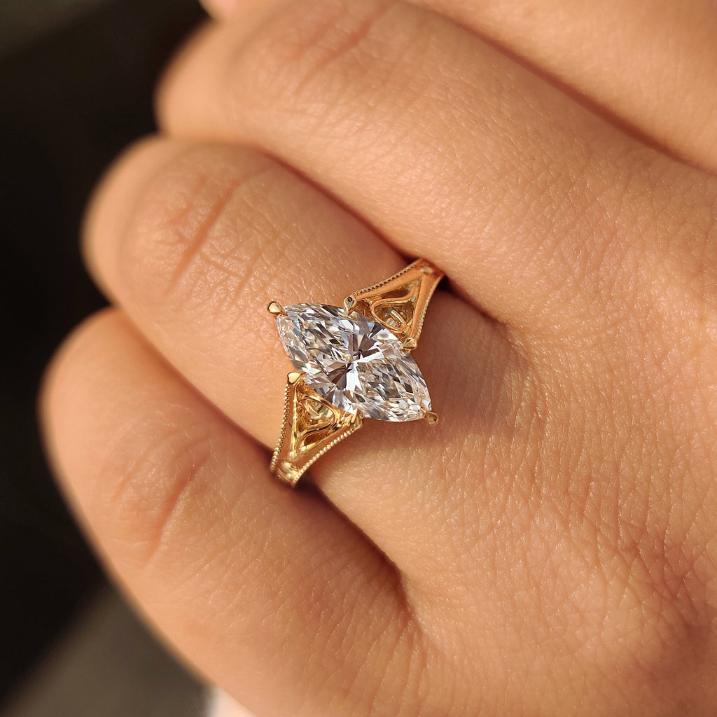 Solitaire Style Marquise Cut Diamond Ring in Milgrain Details