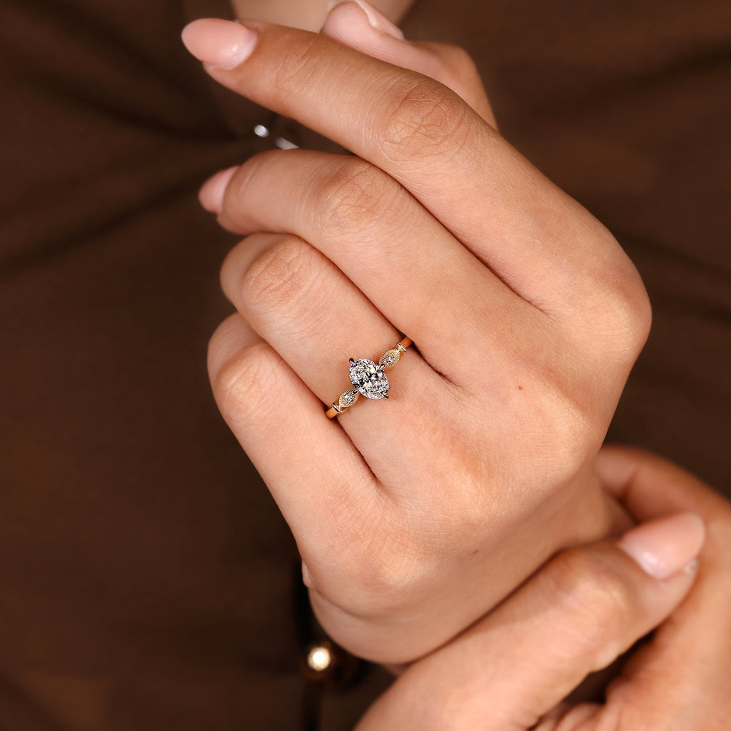 Oval Cut Diamond Ring With Round Side Stone Style