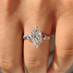 Marquise Cut Diamond Ring in Side Stone Style