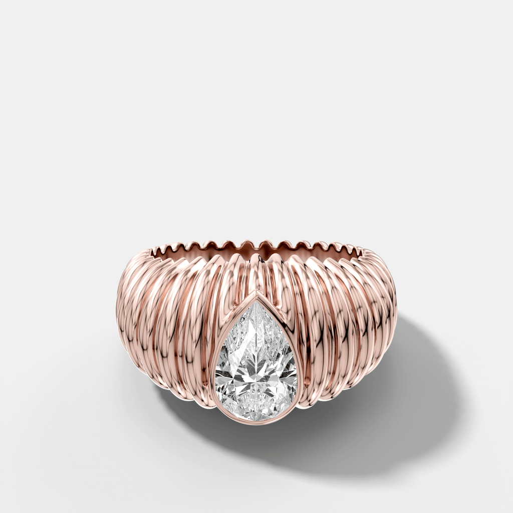 Accordion Cigar Band with a Pear Cut Diamond