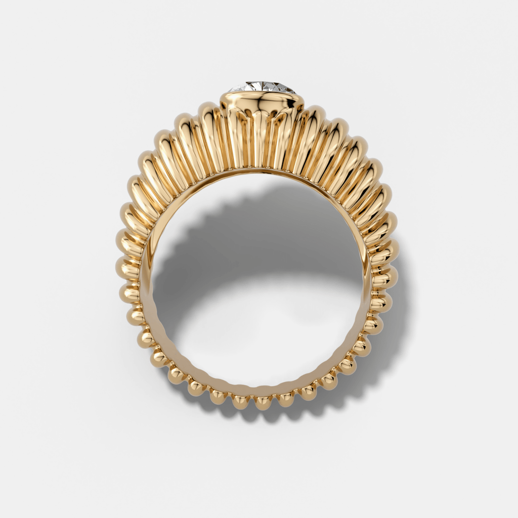 Accordion Cigar Band with a Pear Cut Diamond