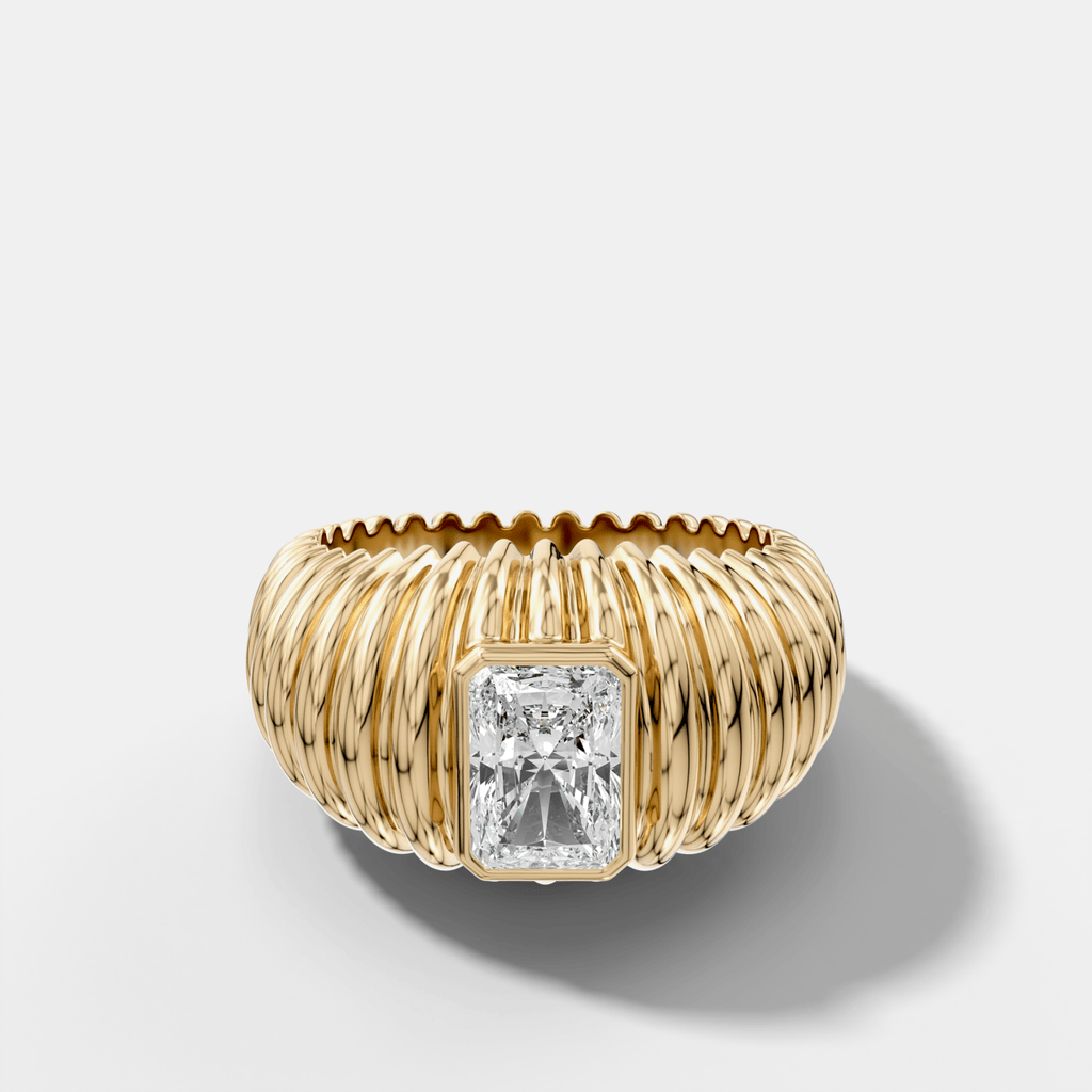 Accordion Cigar Band with an Elongated Radiant Cut Diamond