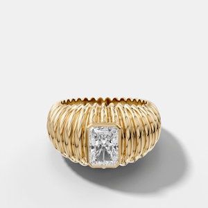 Accordion Cigar Band with an Elongated Radiant Cut Diamond