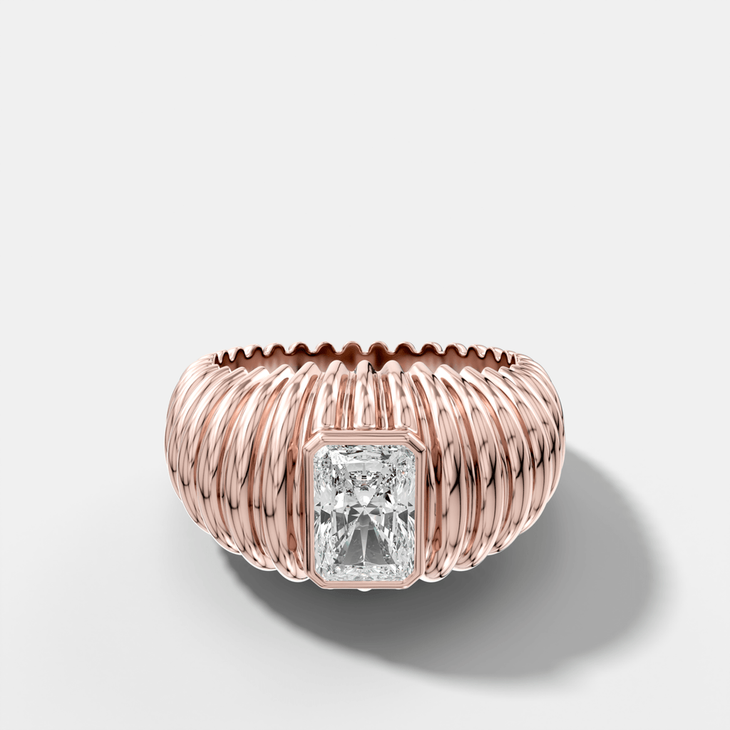 Accordion Cigar Band with an Elongated Radiant Cut Diamond