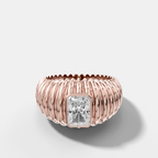 Accordion Cigar Band with an Elongated Radiant Cut Diamond