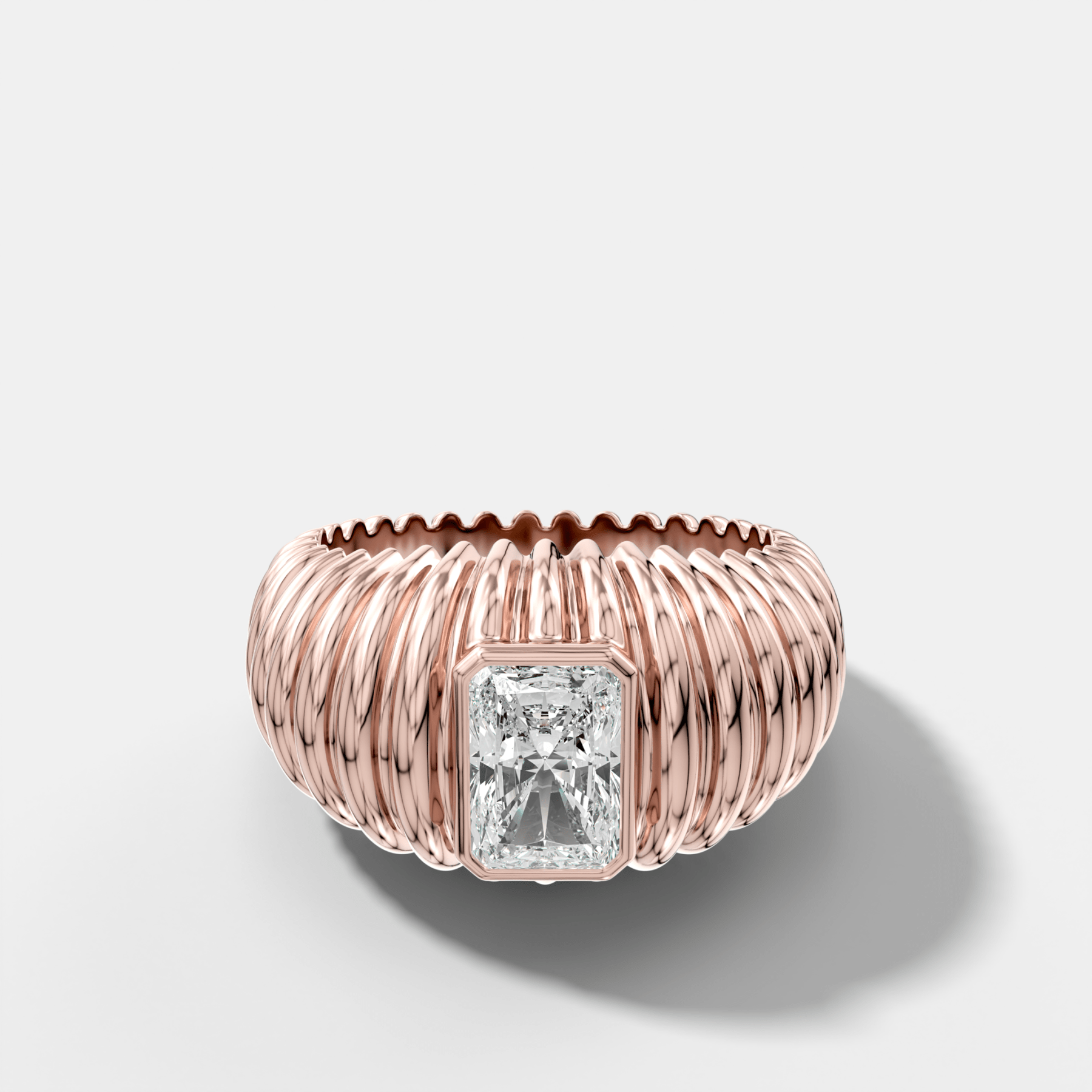 Accordion Cigar Band with an Elongated Radiant Cut Diamond