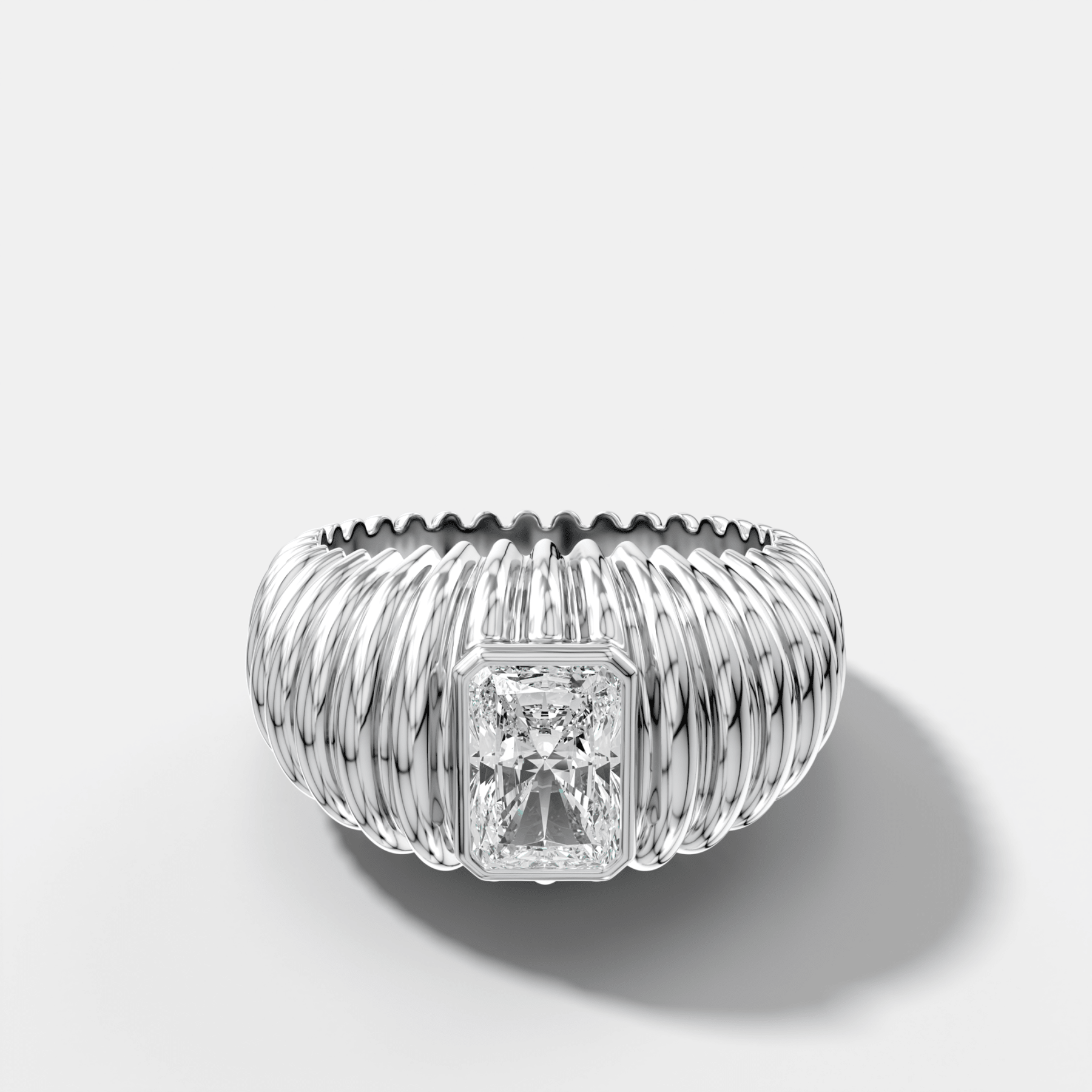 Accordion Cigar Band with an Elongated Radiant Cut Diamond