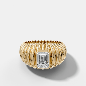 Accordion Cigar Band with an Emerald Cut Diamond
