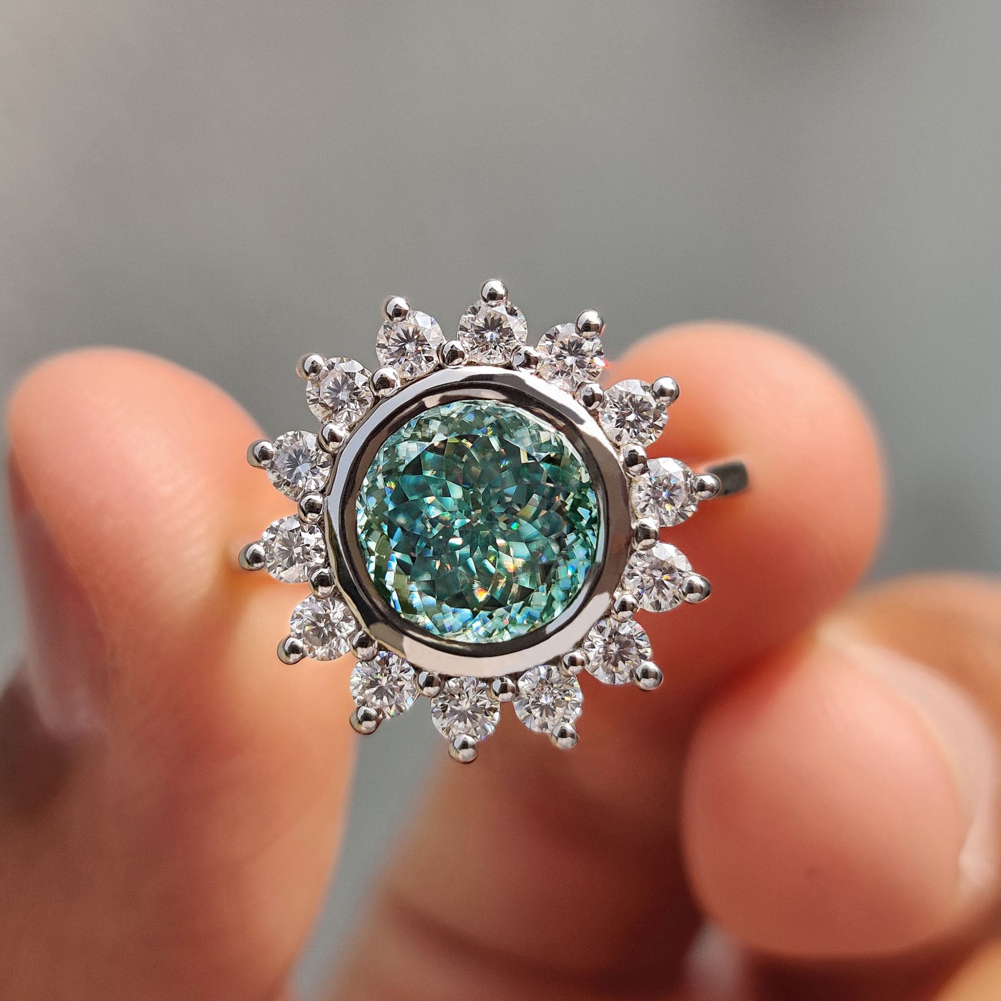 Halo And Bezel Portuguese Cut Engagement Ring