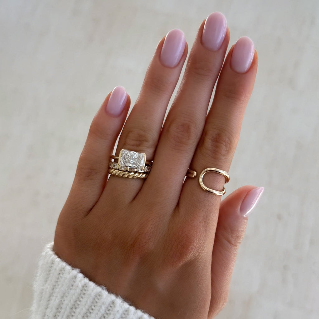Baby Bezel Set Eternity Band With East West Natural Radiant Cuts
