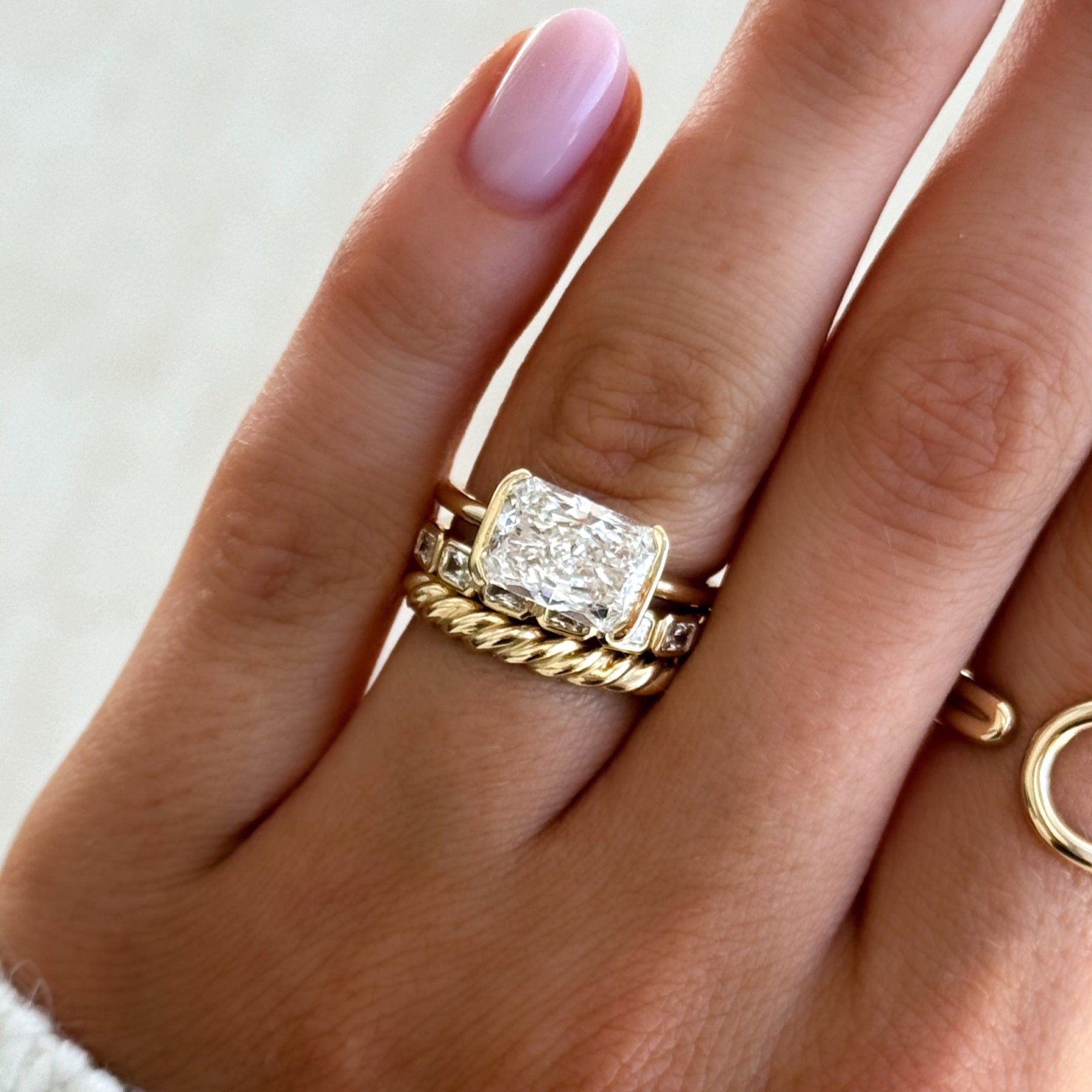 Baby Bezel Set Eternity Band With East West Natural Radiant Cuts