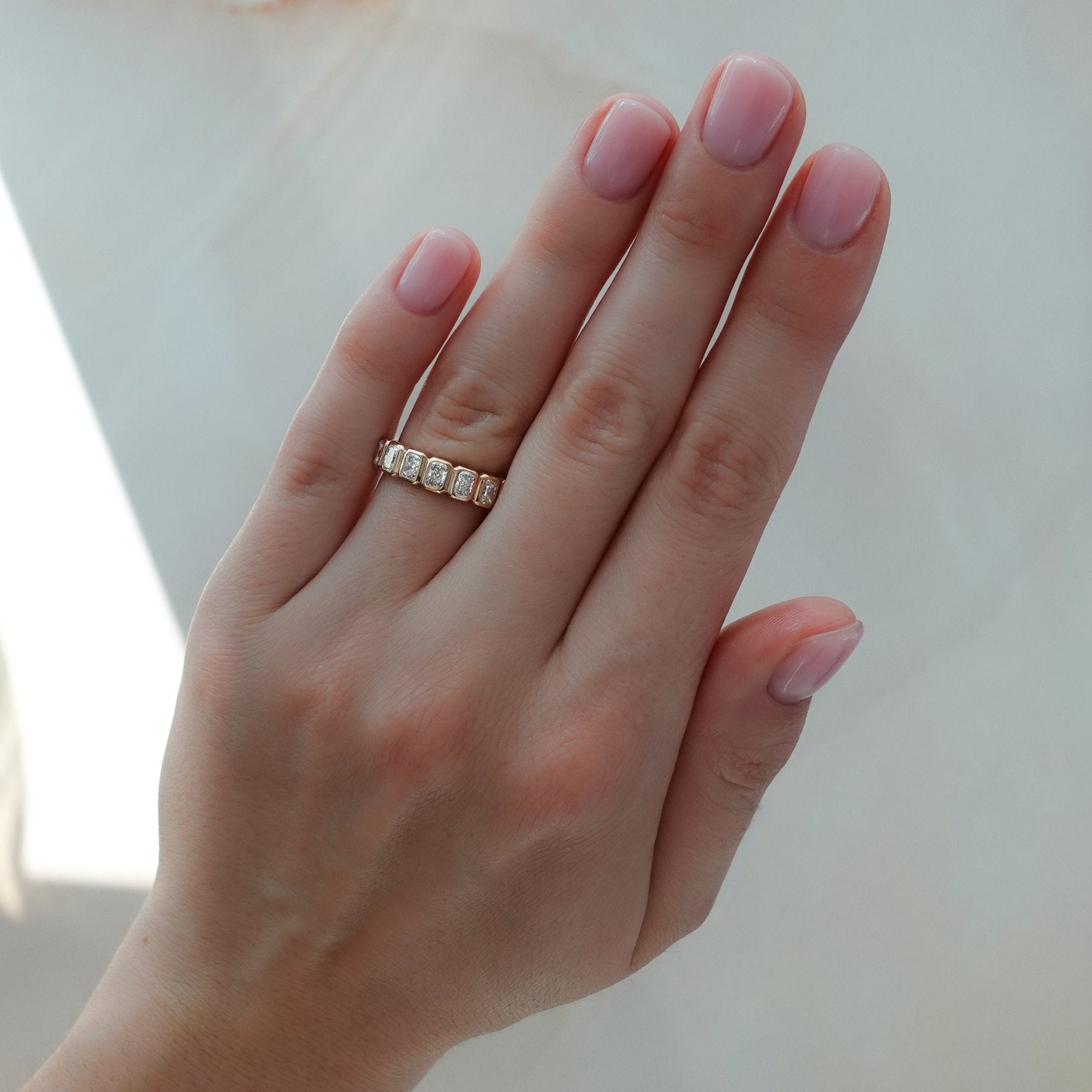 Baby Bezel Set Halfway Wedding Band With Radiant Cuts Secondary image