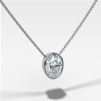 Bezel Pendant Necklace with an Oval Cut Diamond