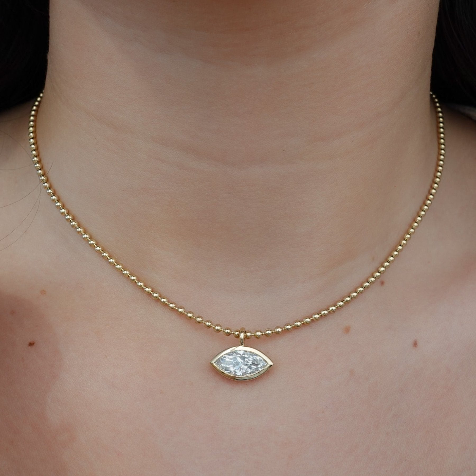 Bezel Set Pendant Beaded Necklace with East West Marquise Cut Diamond